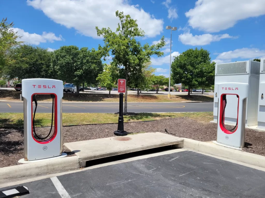 A decorative pole cover at a charging station