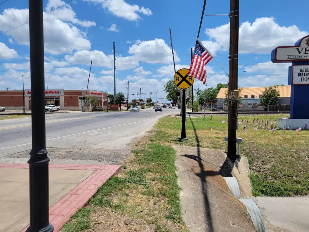 spartan-pole-cover-after-with-railroad-crossing
