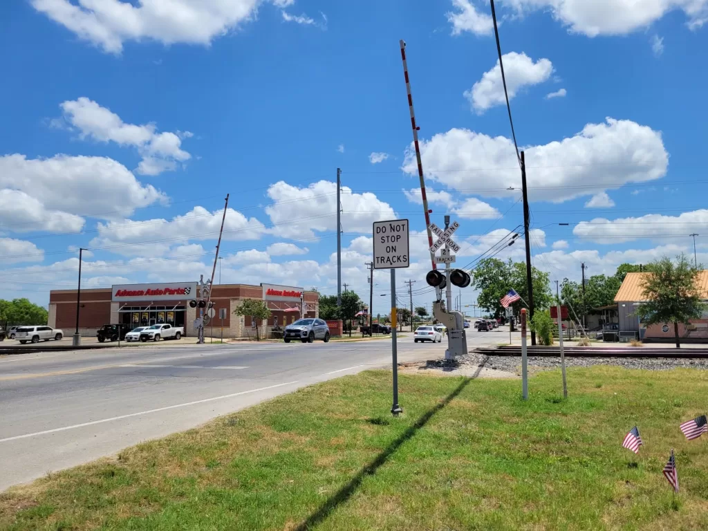 spartan-pole-cover-before-with-railroad-crossing