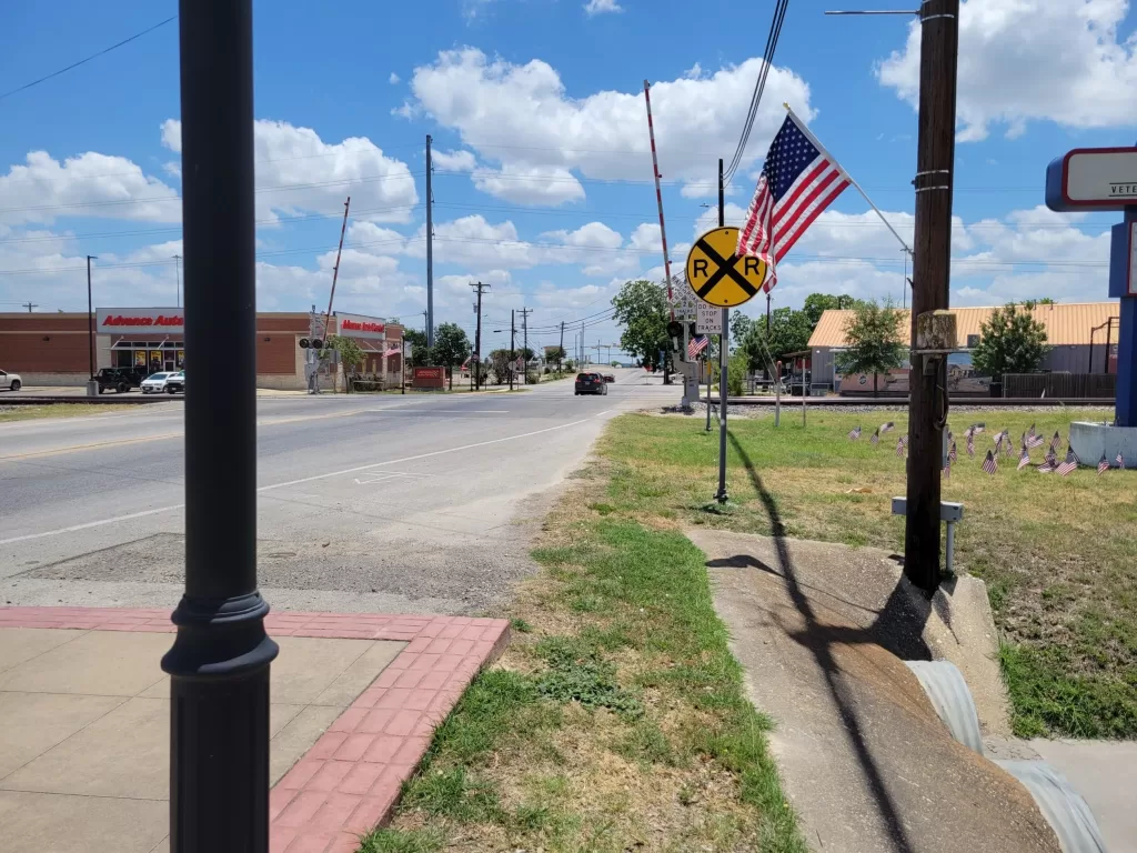 spartan-pole-cover-before-with-railroad-crossing